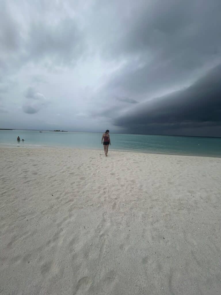Enjoying a beach walk in the Maldives